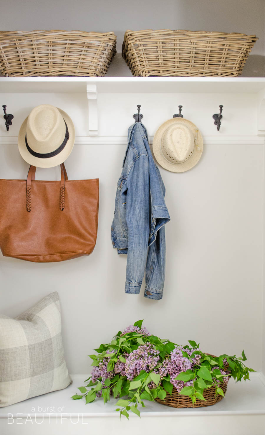 A simple mudroom exudes character and charm in this young family's modern farmhouse. 