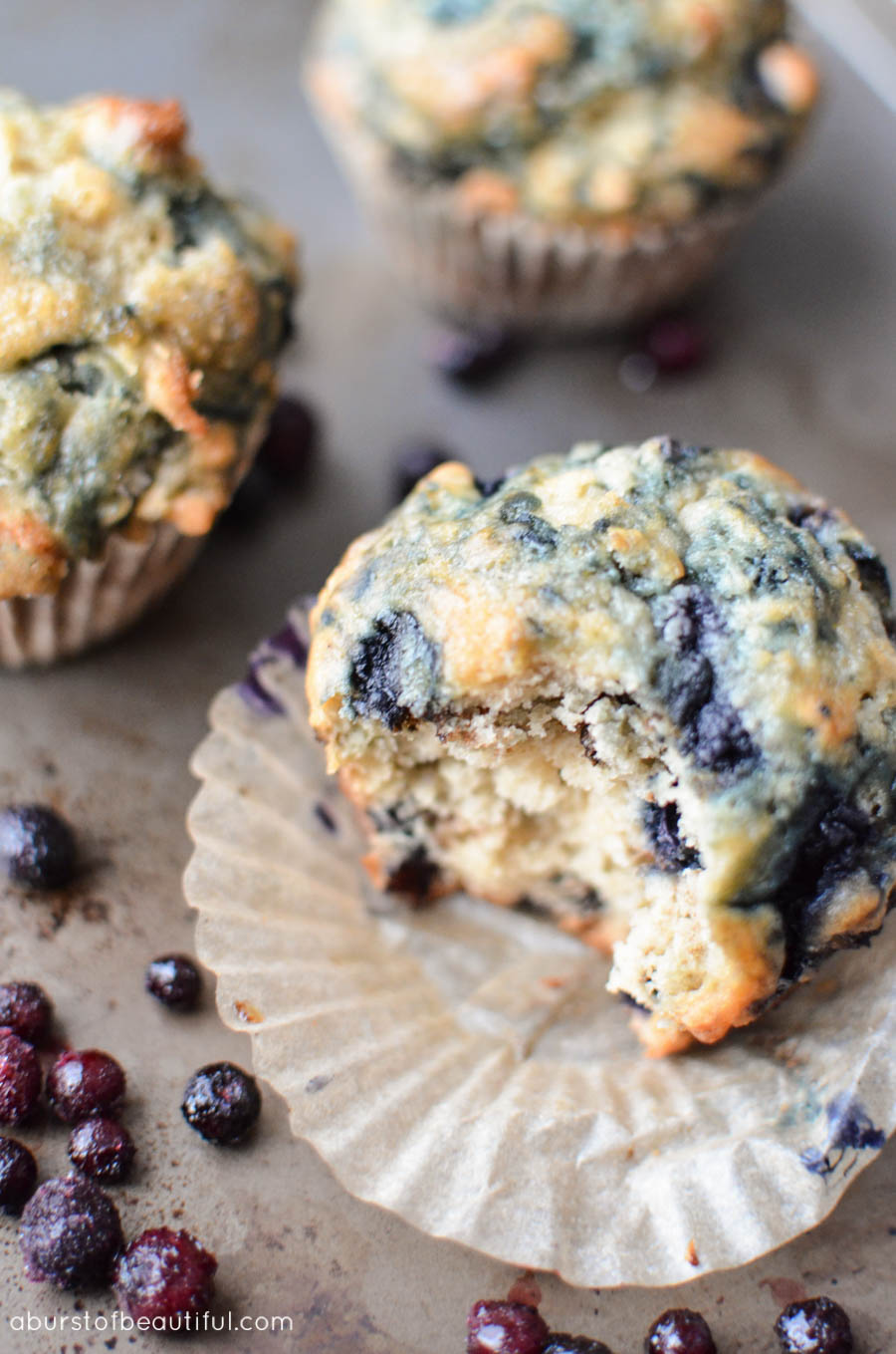 A simple and easy recipe for The Best Blueberry Muffins - fluffy, moist and every bite is bursting with juicy blueberries | A Burst of Beautiful