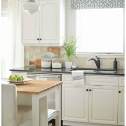A modern farmhouse kitchen is painted light grey (Pale Oak by Benjamin Moore) for a timeless and versatile look. A Burst of Beautiful shares the perfect Modern Farmhouse Neutral Paint Colors for a cozy and inviting home | A Burst of Beautiful