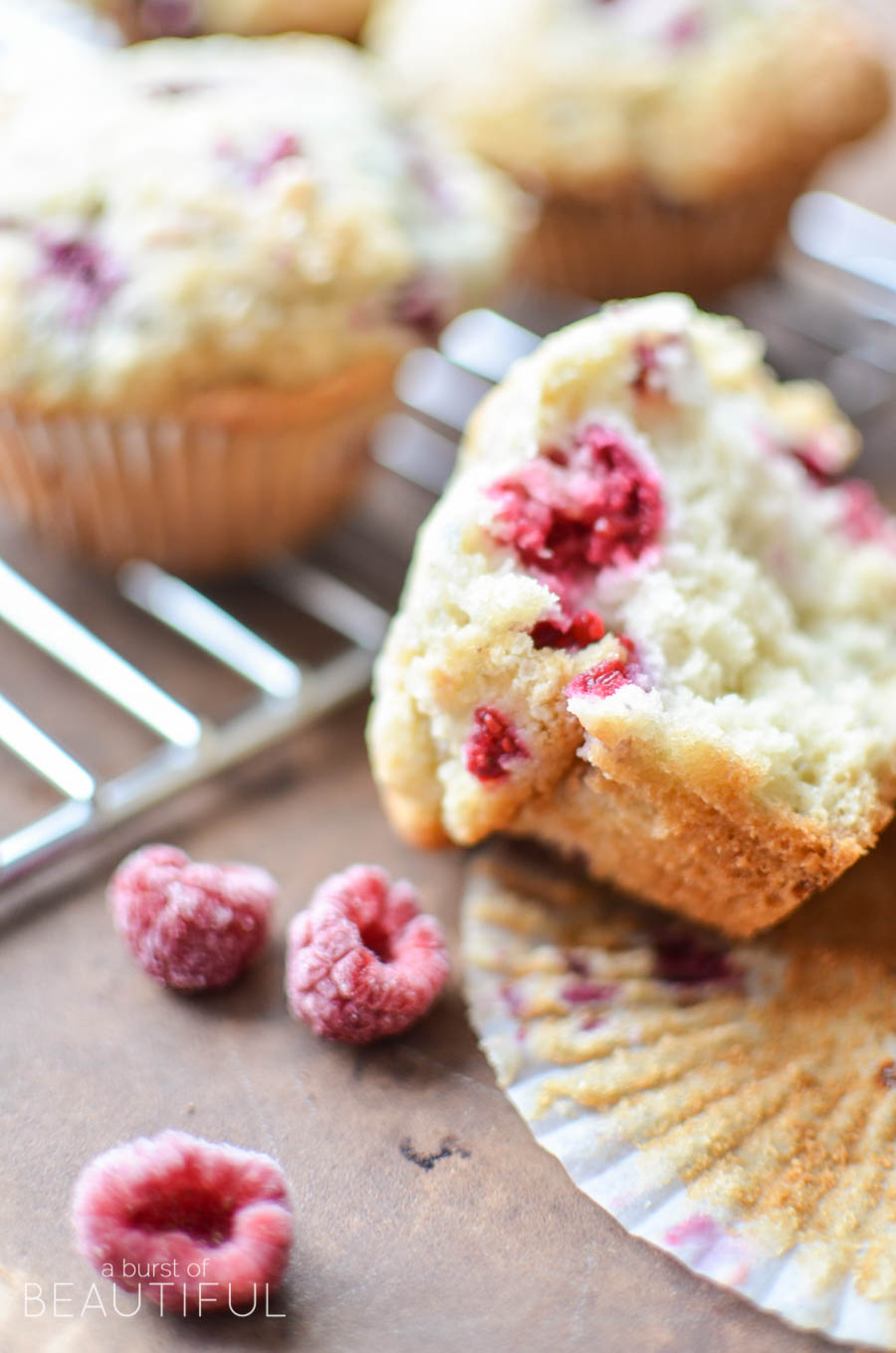 These homemade raspberry muffins are light, fluffy and bursting with juicy raspberries. They are a family favorite any time of the year | A Burst of Beautiful