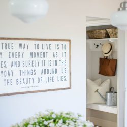 A custom wood sign adds charm and character to this beautiful farmhouse kitchen | A Burst of Beautiful