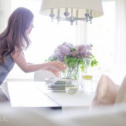 This beautiful modern farmhouse welcomes summer in the country with a fresh, light color palette of soft neutrals paired with plenty of natural wood tones, all highlighted with the simple pleasures of summertime - fresh flowers. The newly renovated mudroom, classic white kitchen and bright and airy open concept living and dining room make this the perfect family home. See all of the inspiring photos, plus 33 blogger home tours in this incredible Summer Home Tour series at www.aburstofbeautiful.com.