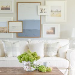 A white slipcovered sofa creates a casual and relaxed feel in this modern farmhouse