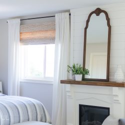 Woven wood shades add texture, color and warmth to this modern farmhouse