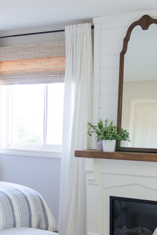 Woven wood shades add texture, color and warmth to this modern farmhouse