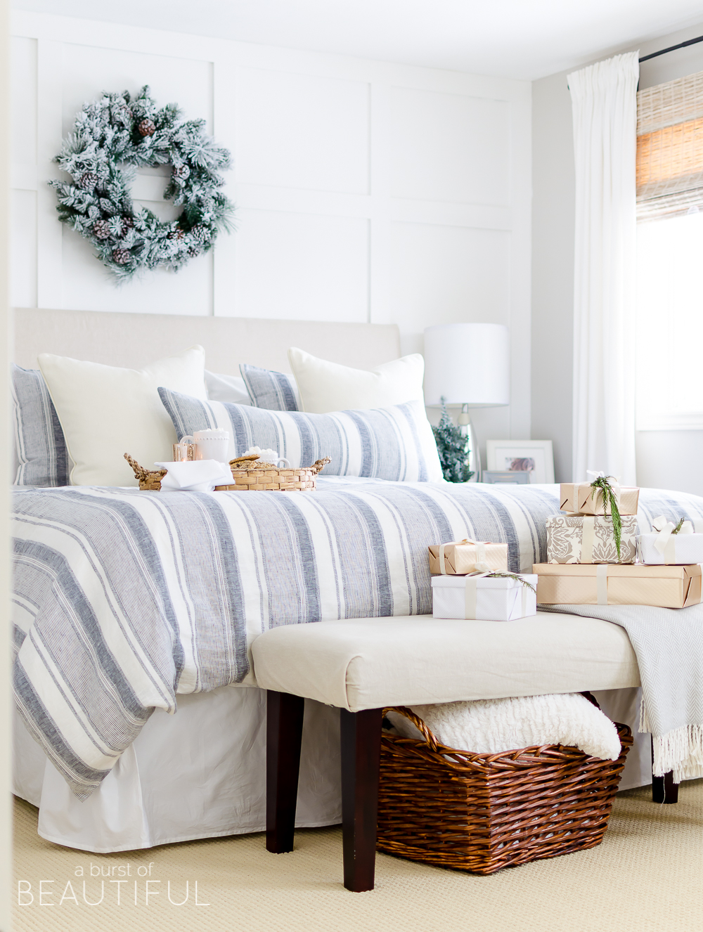 A cozy neutral Christmas bedroom full of farmhouse charm