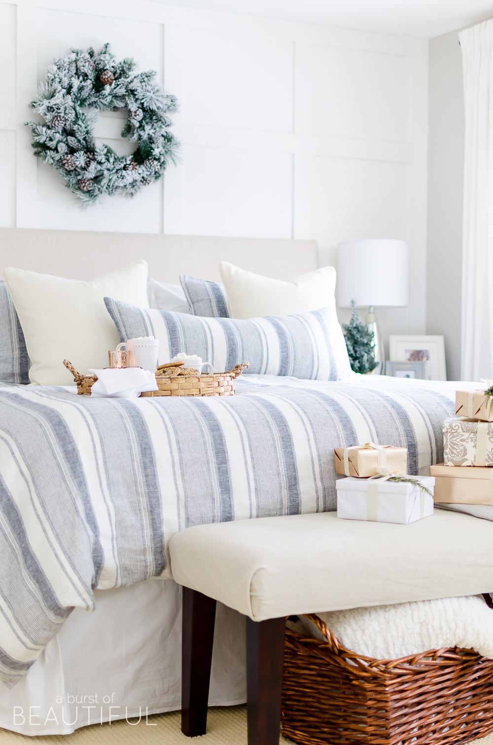 A cozy neutral Christmas bedroom full of farmhouse charm