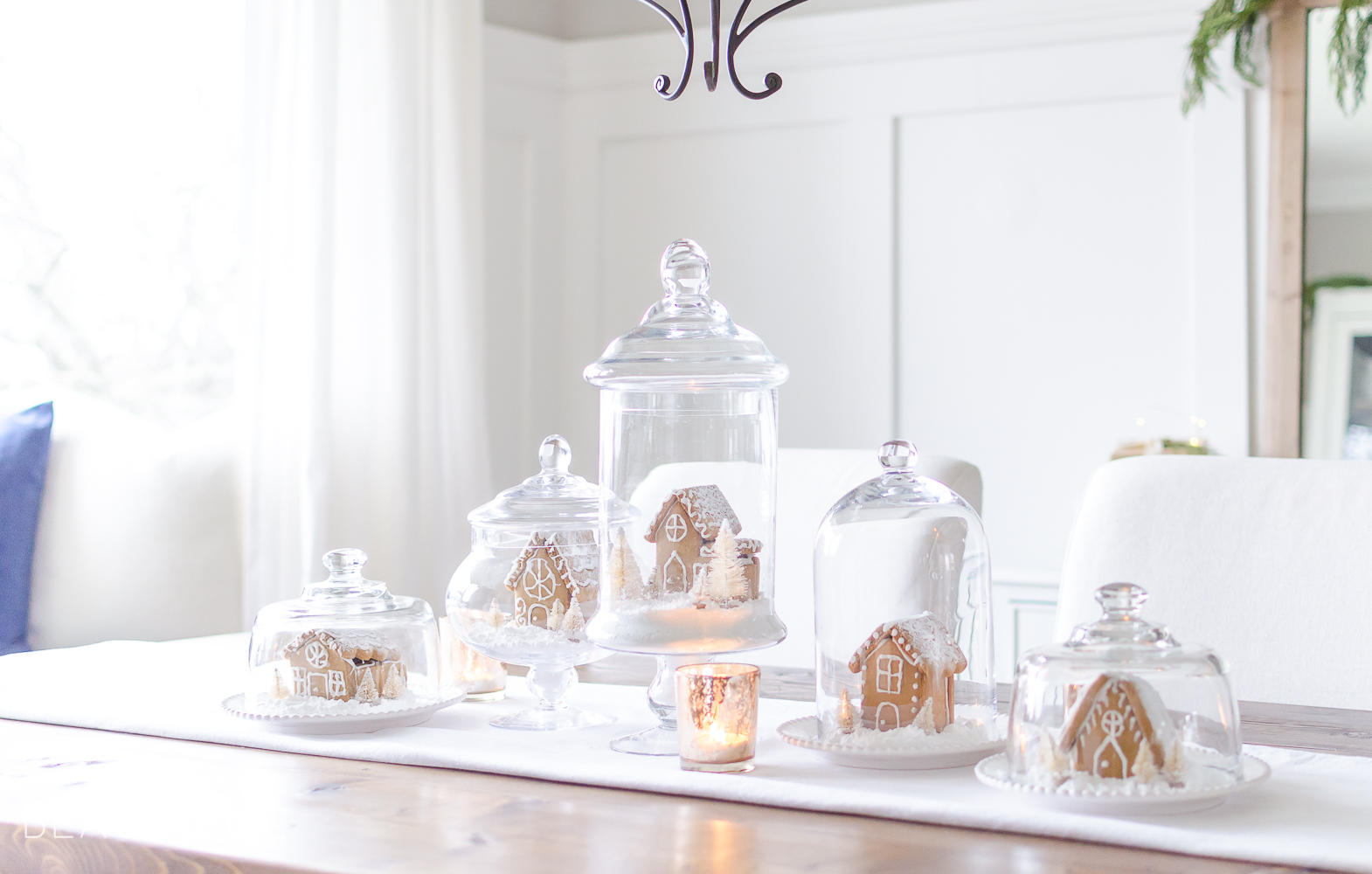 An inviting holiday dining room in this modern farmhouse is full of whimsical Christmas charm