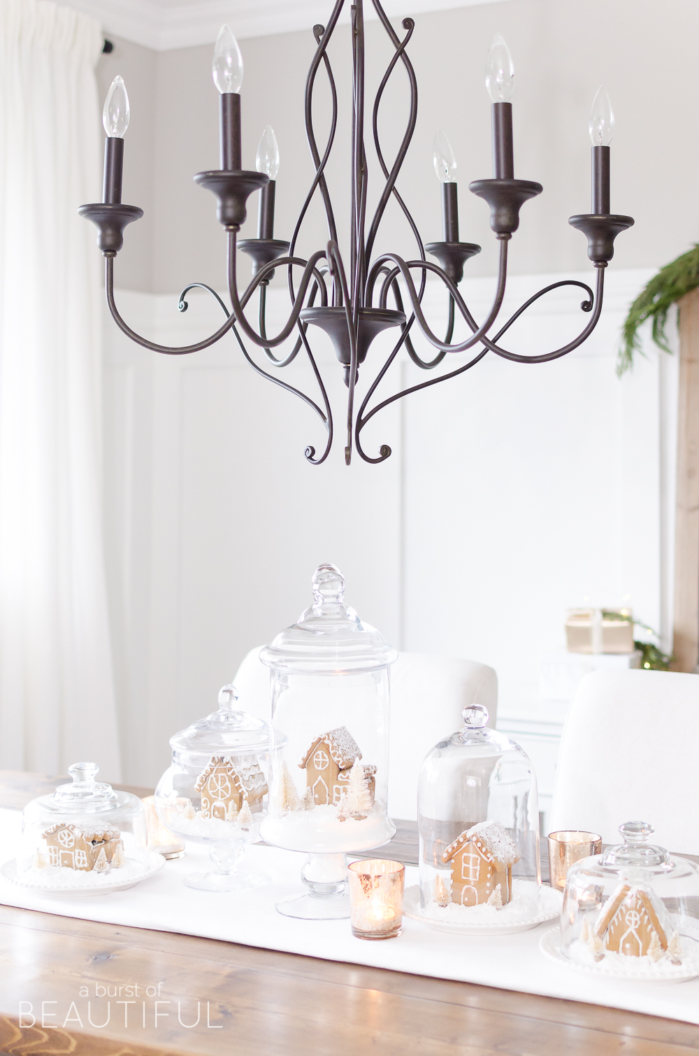 An inviting holiday dining room in this modern farmhouse is full of whimsical Christmas charm