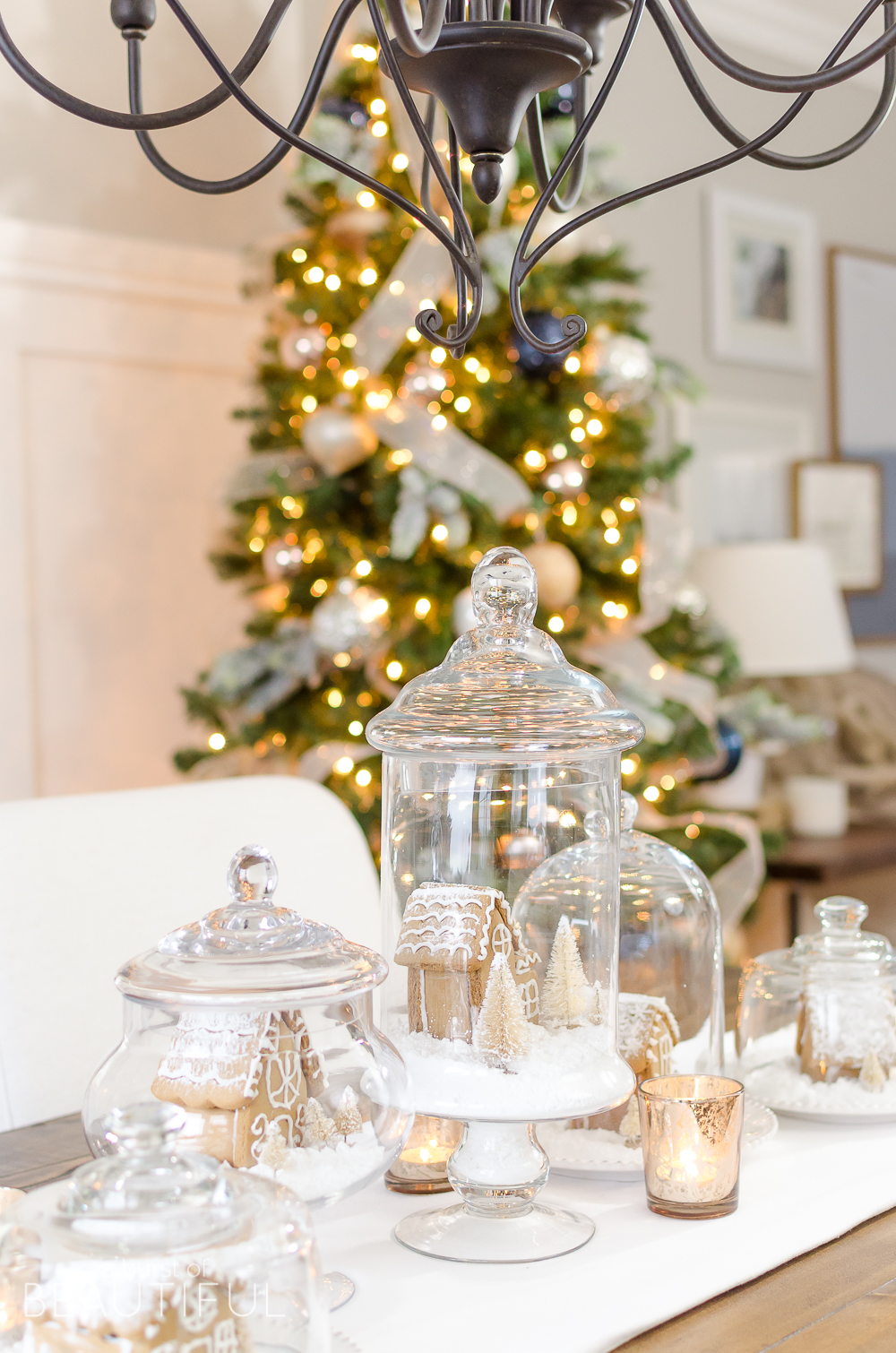 An inviting holiday dining room in this modern farmhouse is full of whimsical Christmas charm