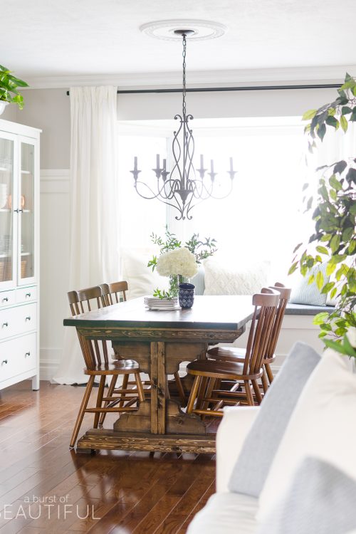 Spring Home Tour | Our Dining Room - A modern farmhouse feels bright and inviting as it embraces the spring season. Tour the full home at www.aburstofbeautiful.com.