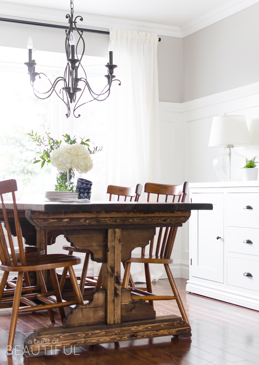 Spring Home Tour | Our Dining Room - A modern farmhouse feels bright and inviting as it embraces the spring season. Tour the full home at www.aburstofbeautiful.com. 