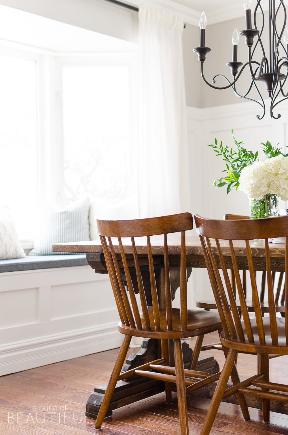Spring Home Tour | Our Dining Room - A modern farmhouse feels bright and inviting as it embraces the spring season. Tour the full home at www.aburstofbeautiful.com. 