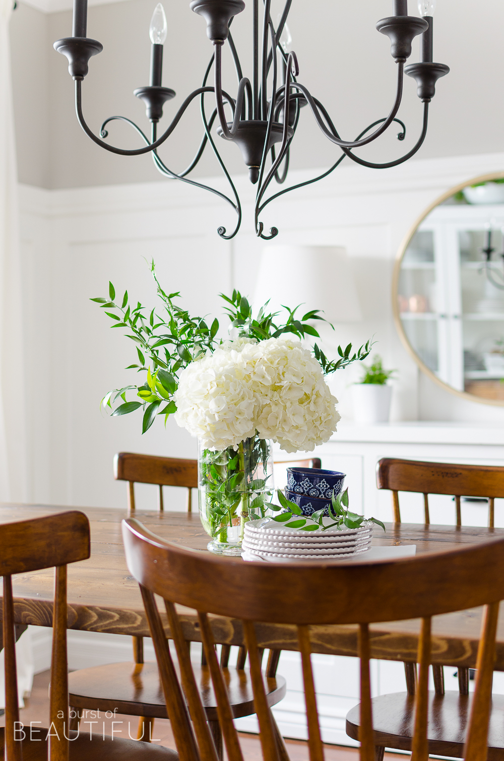 Spring Home Tour | Our Dining Room - A modern farmhouse feels bright and inviting as it embraces the spring season. Tour the full home at www.aburstofbeautiful.com. 