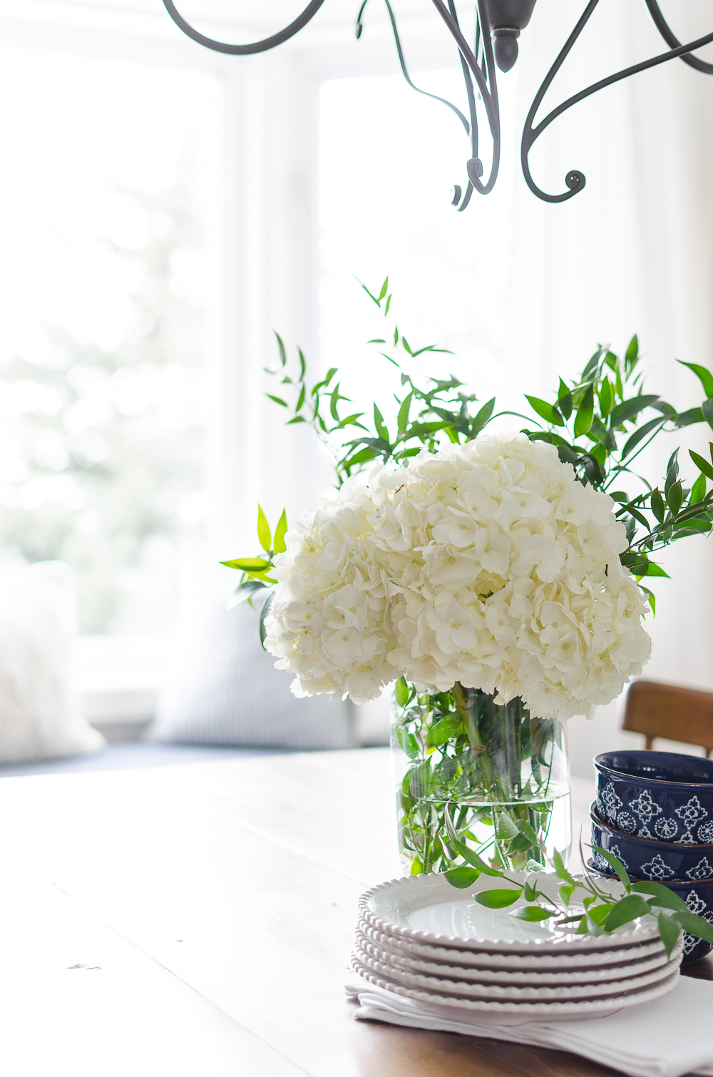 Spring Home Tour | Our Dining Room - A modern farmhouse feels bright and inviting as it embraces the spring season. Tour the full home at www.aburstofbeautiful.com. 