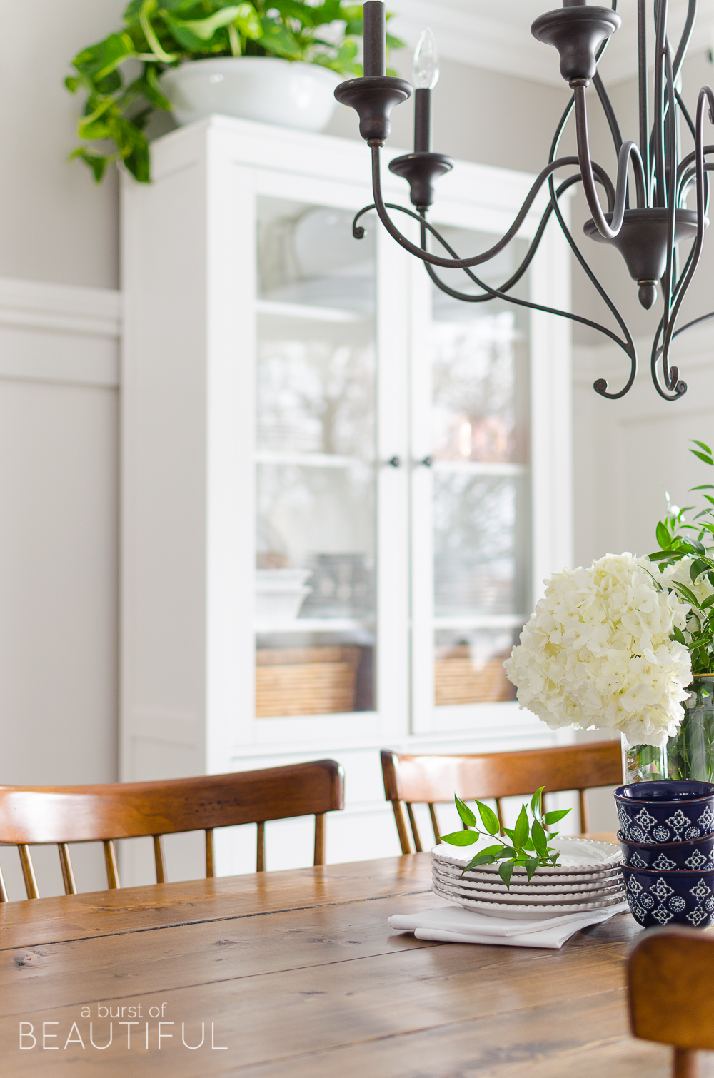Spring Home Tour | Our Dining Room - A modern farmhouse feels bright and inviting as it embraces the spring season. Tour the full home at www.aburstofbeautiful.com. 