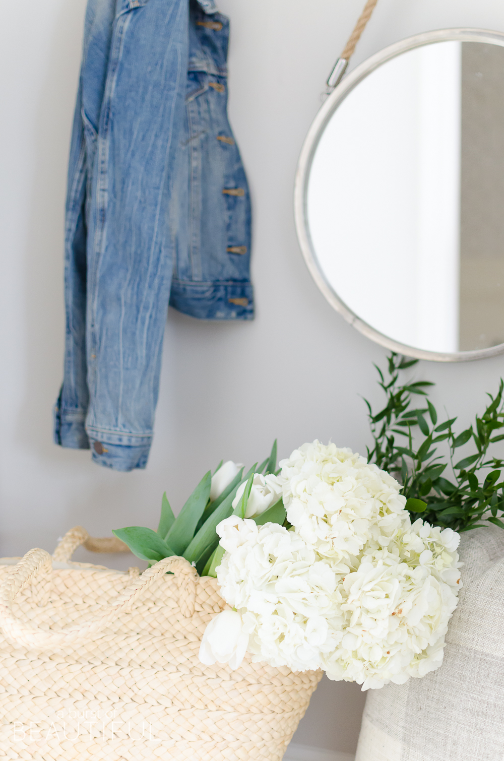 A pretty and functional mudroom is ready for the season in this modern farmhouse's bright and inviting spring home tour. 