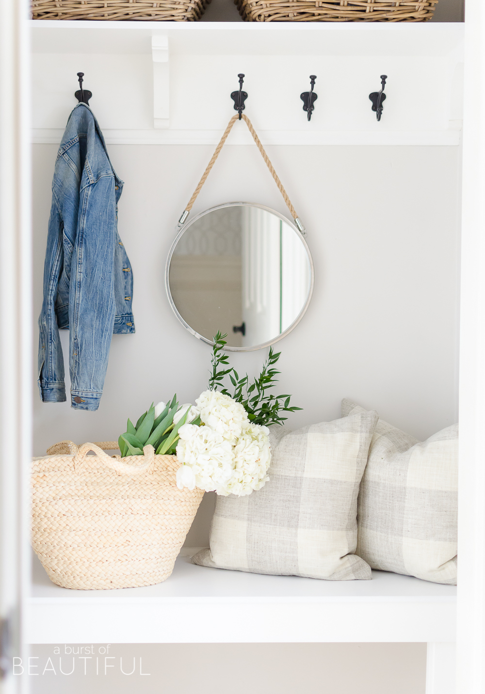 A pretty and functional mudroom is ready for the season in this modern farmhouse's bright and inviting spring home tour.