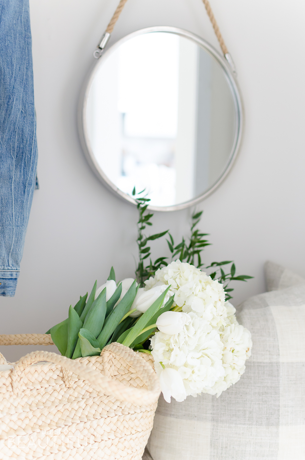A pretty and functional mudroom is ready for the season in this modern farmhouse's bright and inviting spring home tour.