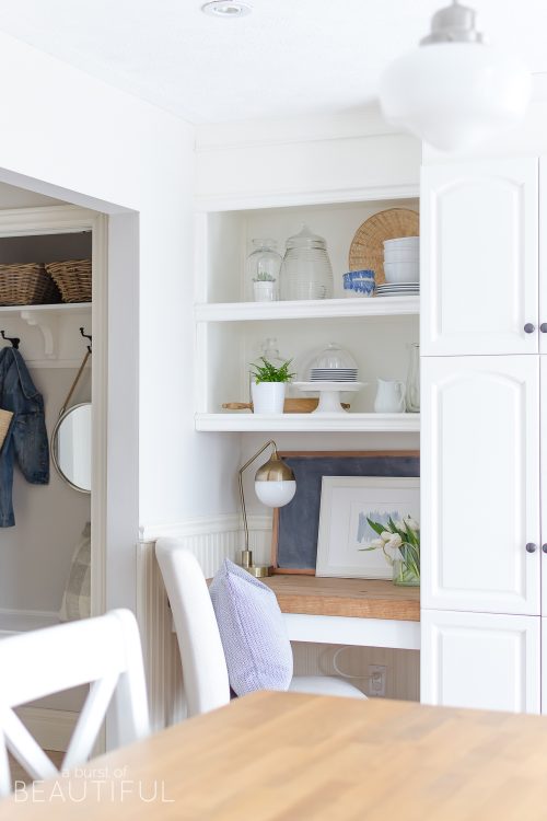 A bright and beautiful farmhouse kitchen embraces spring with subtle hints of the season in this welcoming spring home tour.