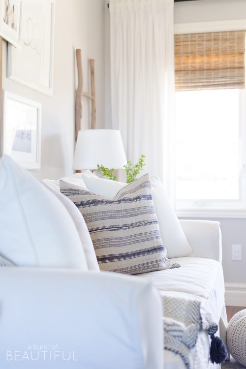 The easiest way to update your space is by adding new art and accessories, like throw pillows.