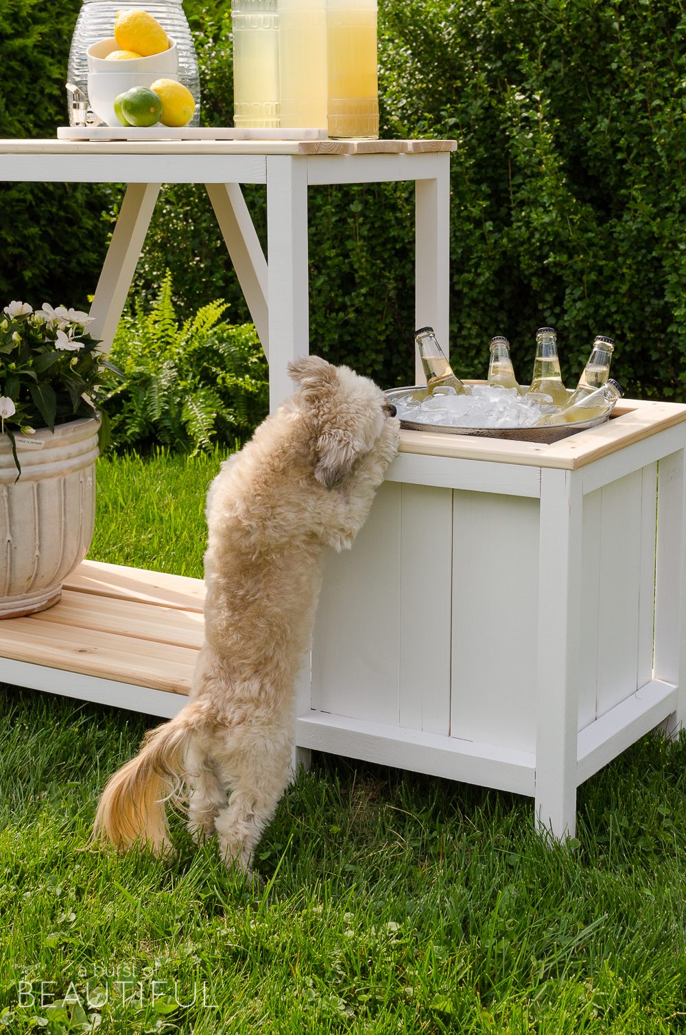 Summer entertaining is easy with this beautiful DIY outdoor bar + free plans.