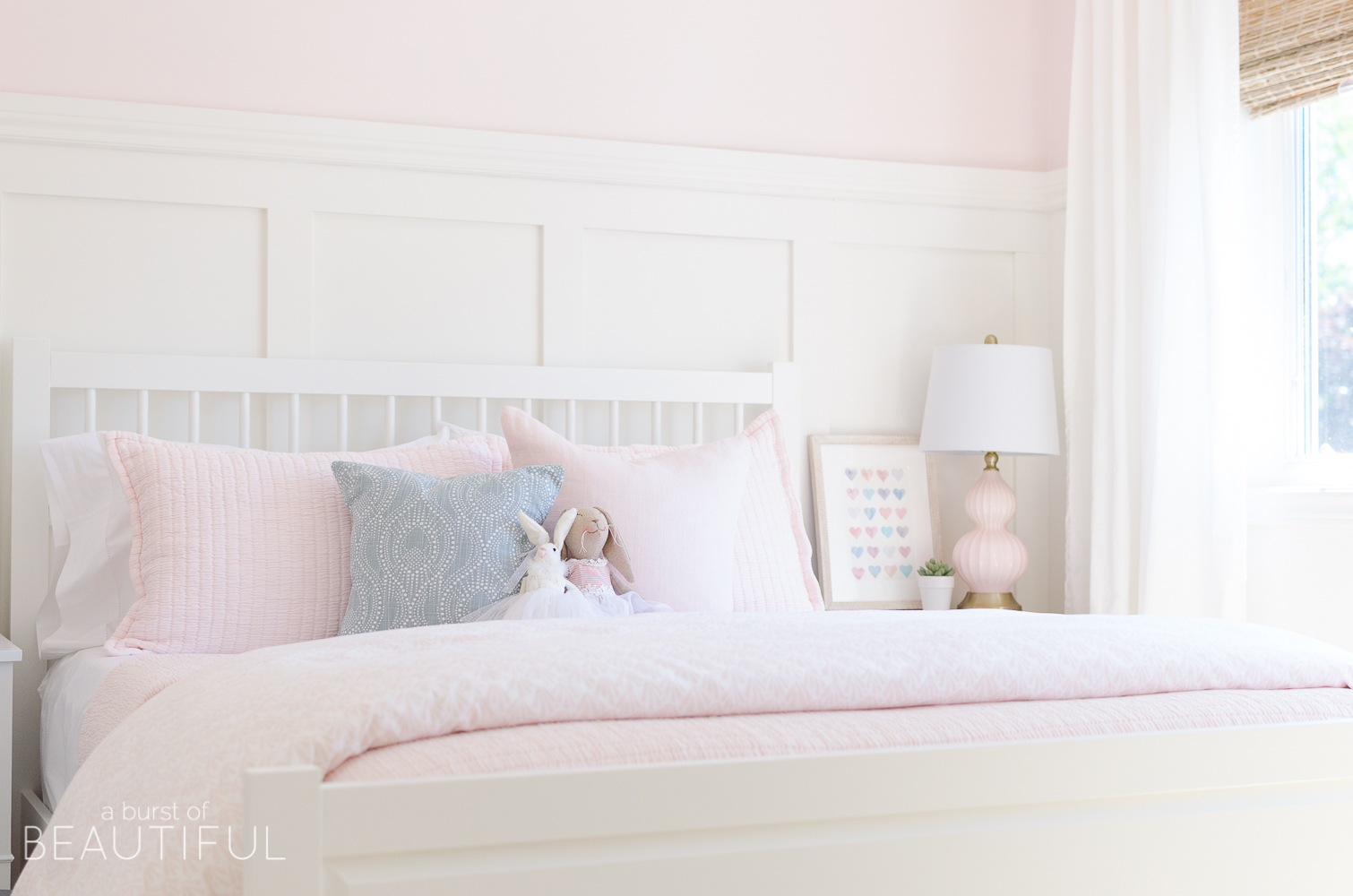 Toddler Girl Pink Bedroom Design & Decor Ideas with artwork, pillows, board and batten, pink comforter