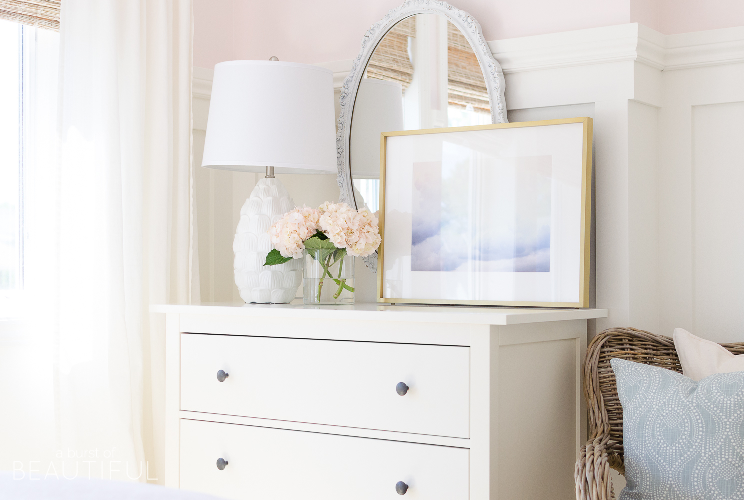 Toddler Girl Pink Bedroom Design & Decor with dresser, mirror, artwork and flowers