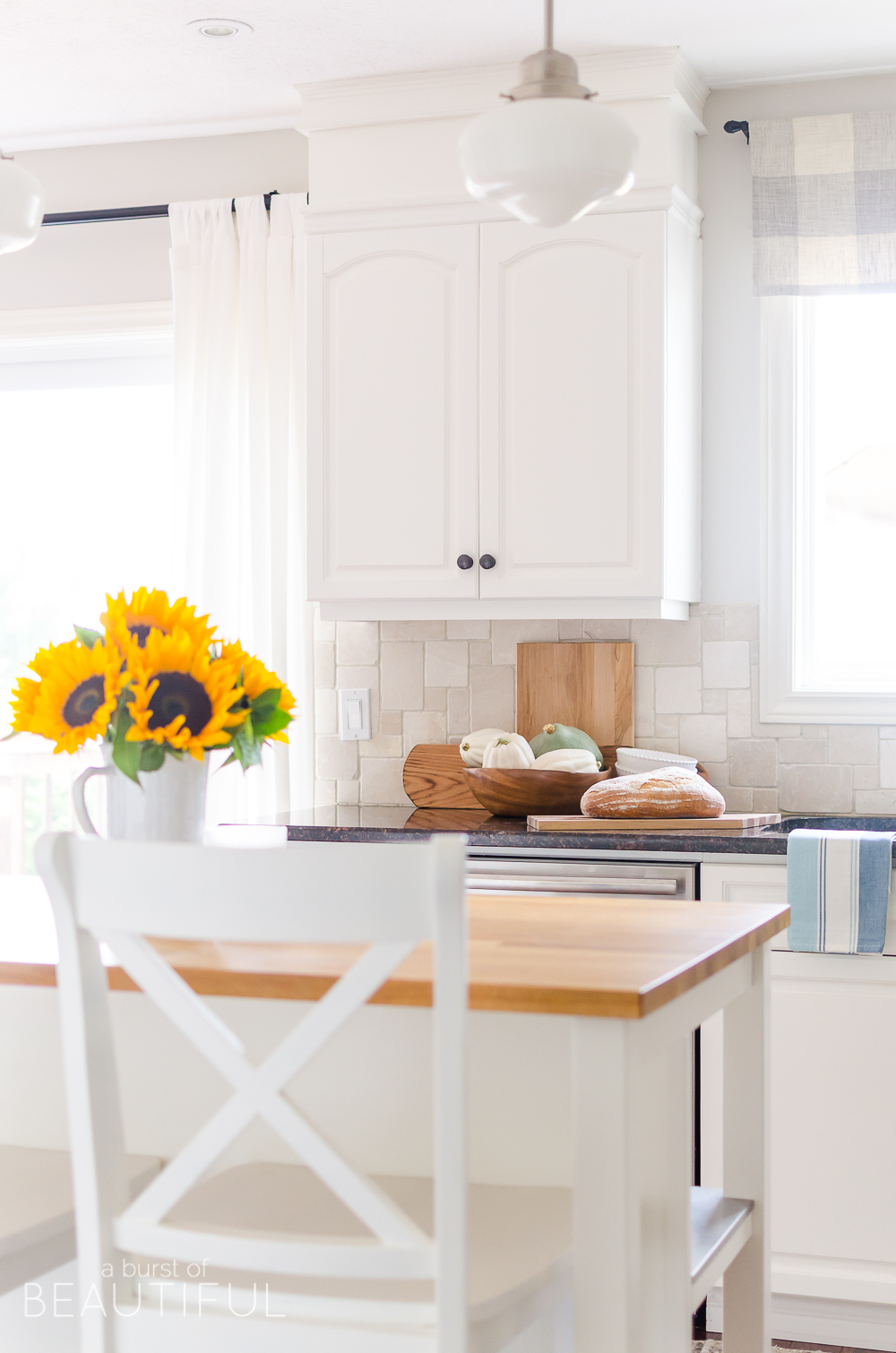 Take a tour of this modern farmhouse kitchen and mudroom featuring subtle fall touches. 