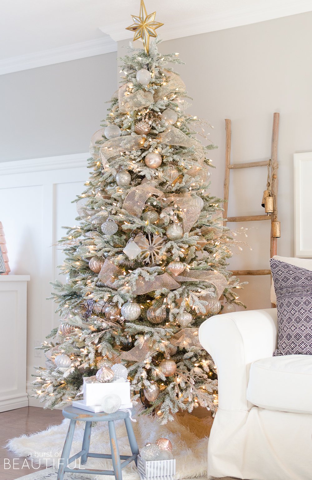 How beautiful is this flocked Christmas Tree decorated with