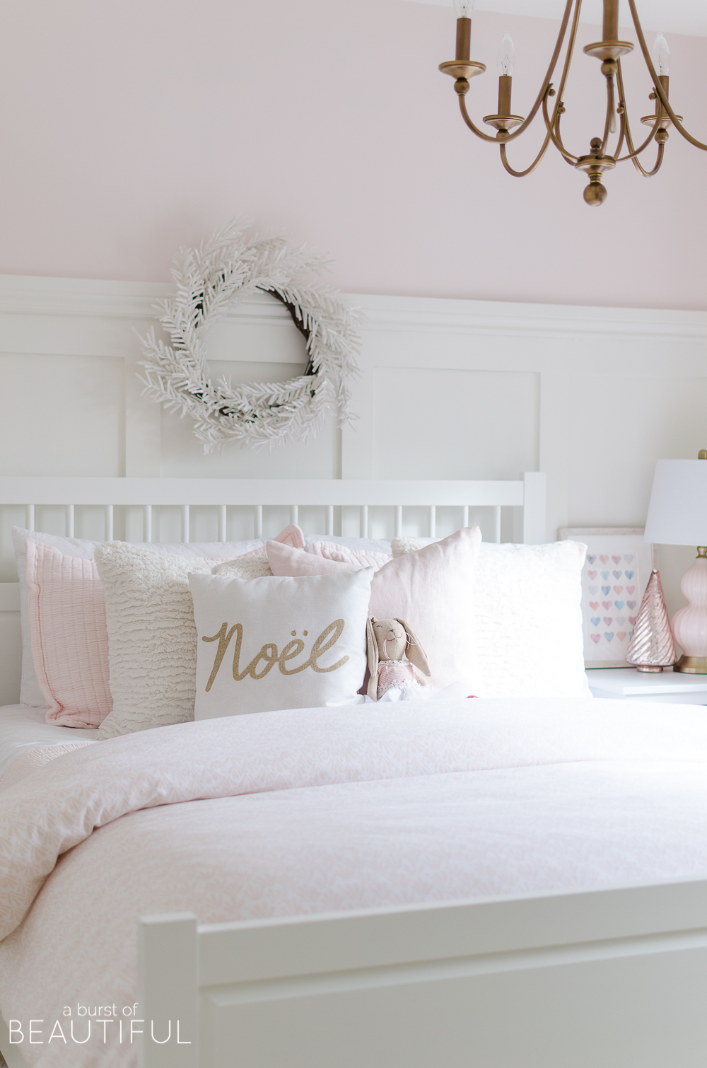 A pink and white Christmas Bedroom