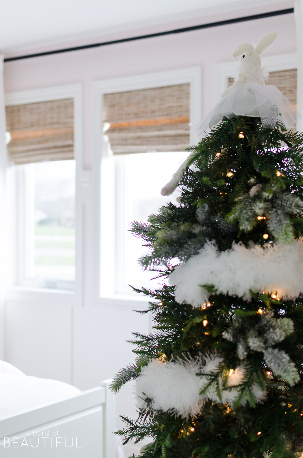 A pink and white Christmas Bedroom