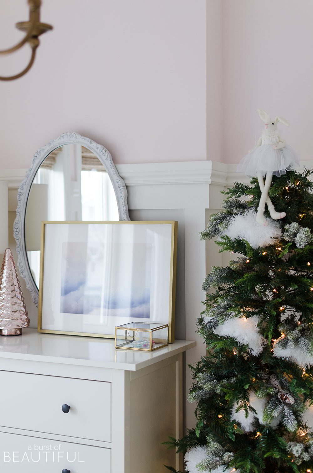 A pink and white Christmas Bedroom