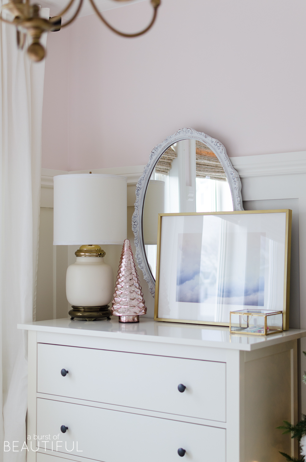 A pink and white Christmas Bedroom