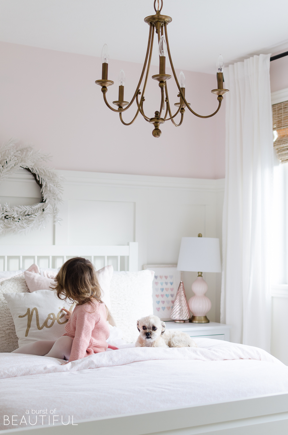 A pink and white Christmas Bedroom