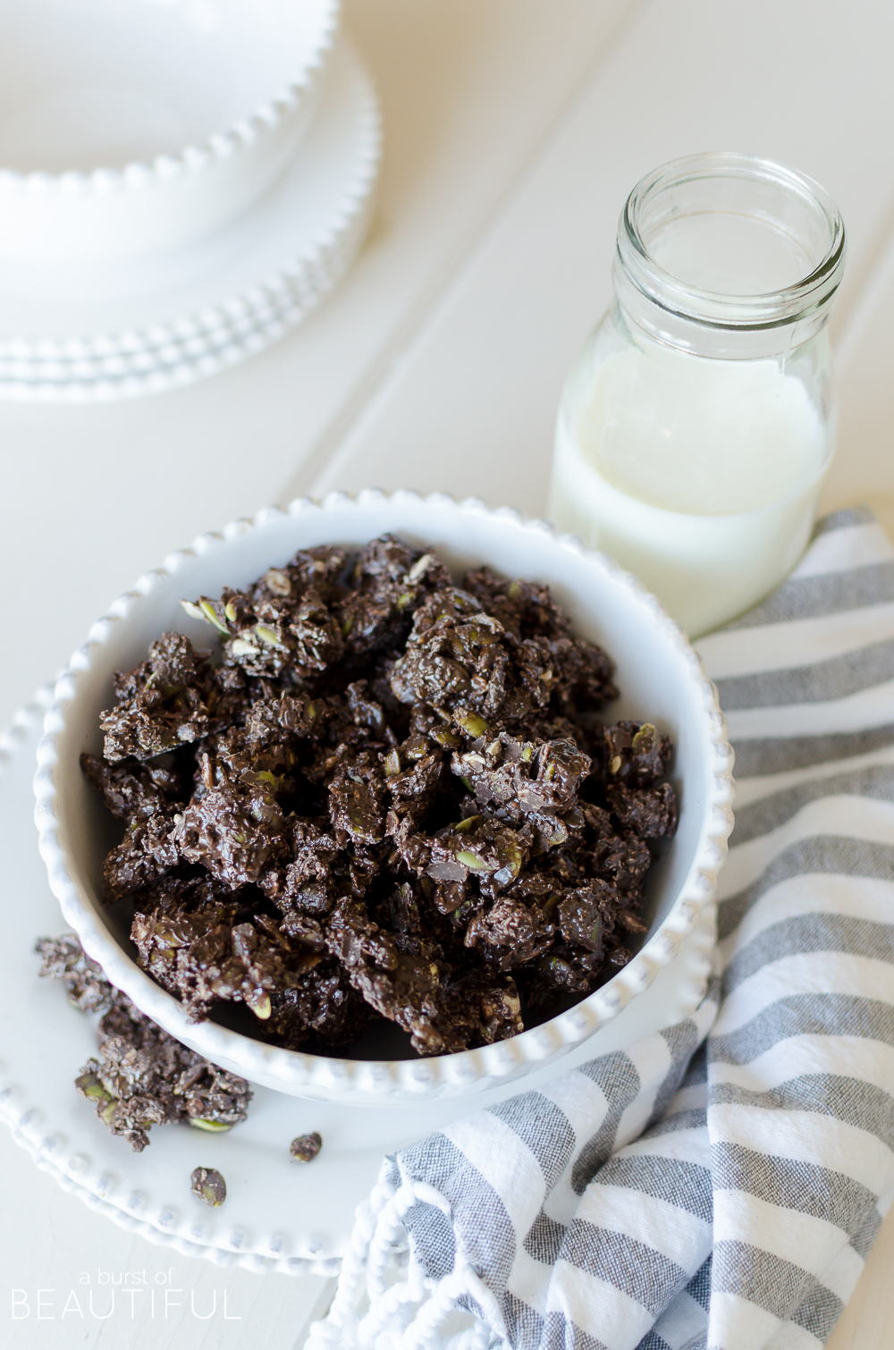 Healthy dark chocolate bites made with dark chocolate, sunflower seeds, pumpkin seeds and coconut are a perfectly satisfying and healthy snack.