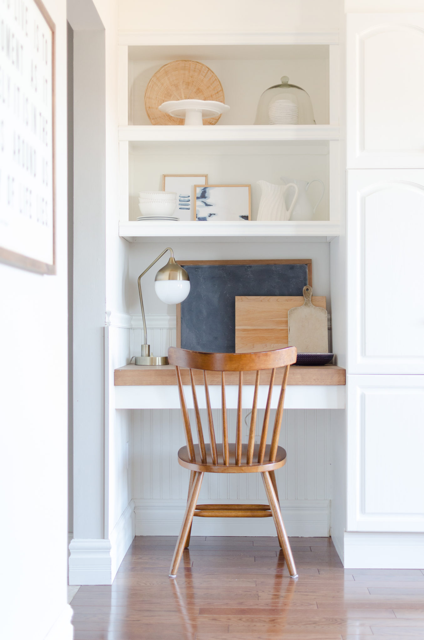 Create warmth in a white kitchen using cutting boards - Duke Manor Farm by  Laura Janning