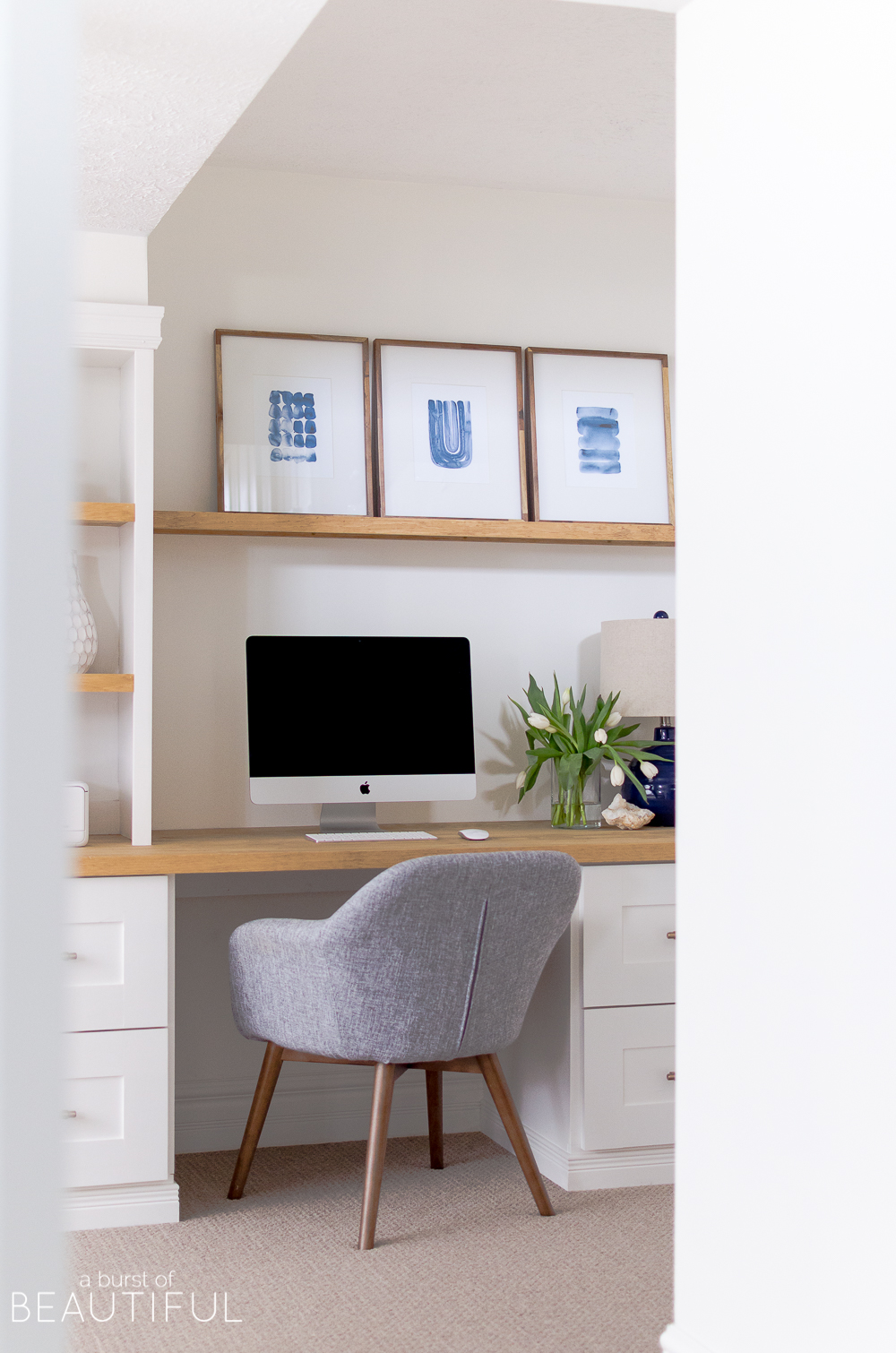 A small nook provides the perfect space for home office or studio, with this simple built-in desk