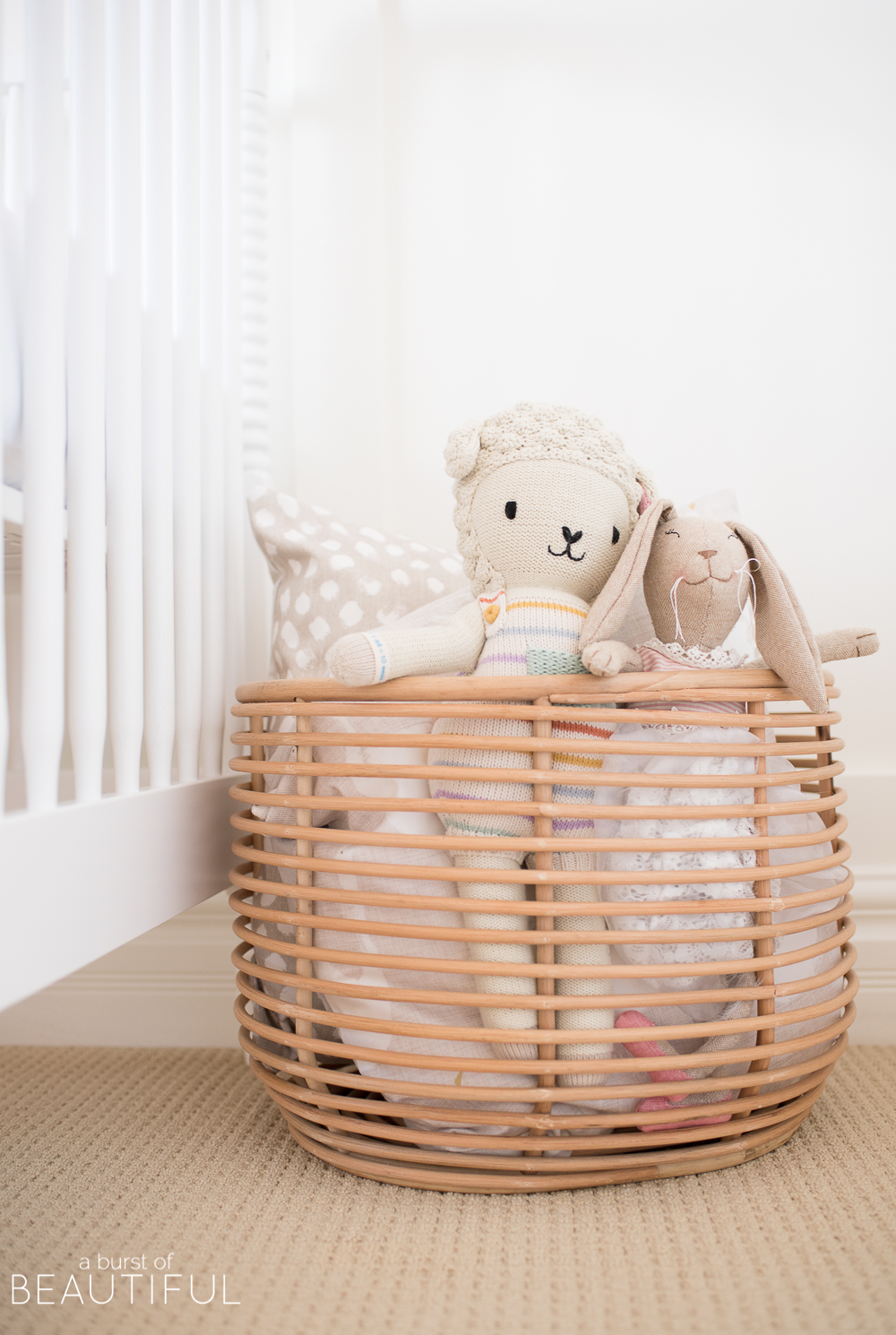 Soft shades of lavender and rose mixed with whimsical details bring this sweet and colorful nursery to life. 