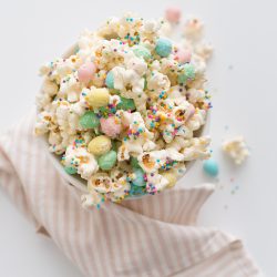 Popcorn drizzled in melted white chocolate and mixed with mini eggs and sprinkles is a fun and sweet treat for Easter, find the easy recipe here. 