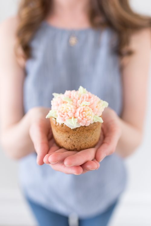 Banana Lavender Cupcakes Decorated With Buttercream Frosting Flowers